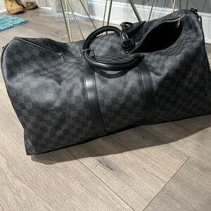 Keepall 55 Bandouliere in Damier Graphite Canvas | LOUIS VUITTON ®